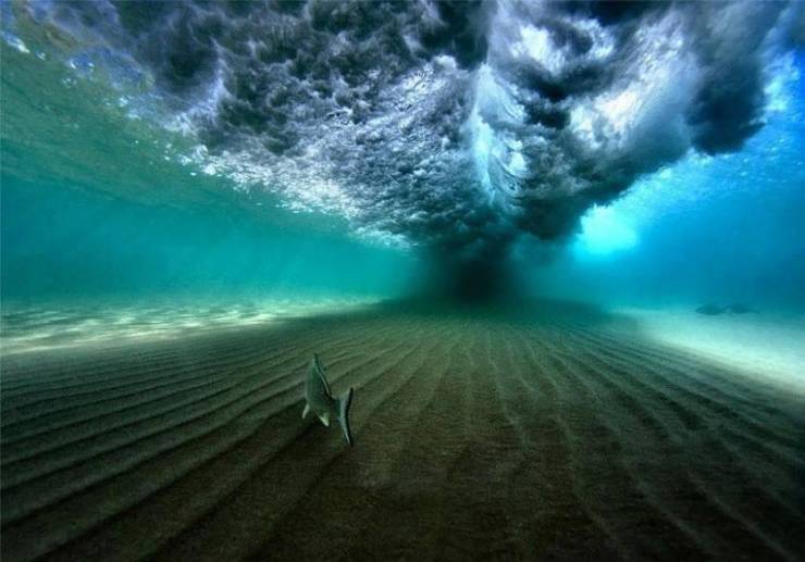 Underneath a breaking wave.