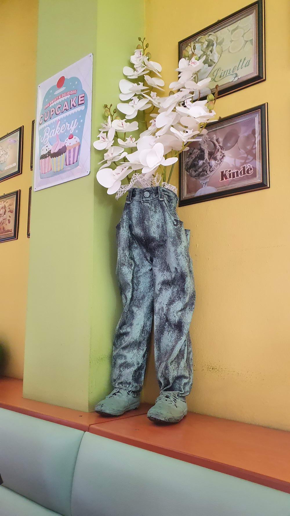 wtf images - old jeans turned into creepy flower vase