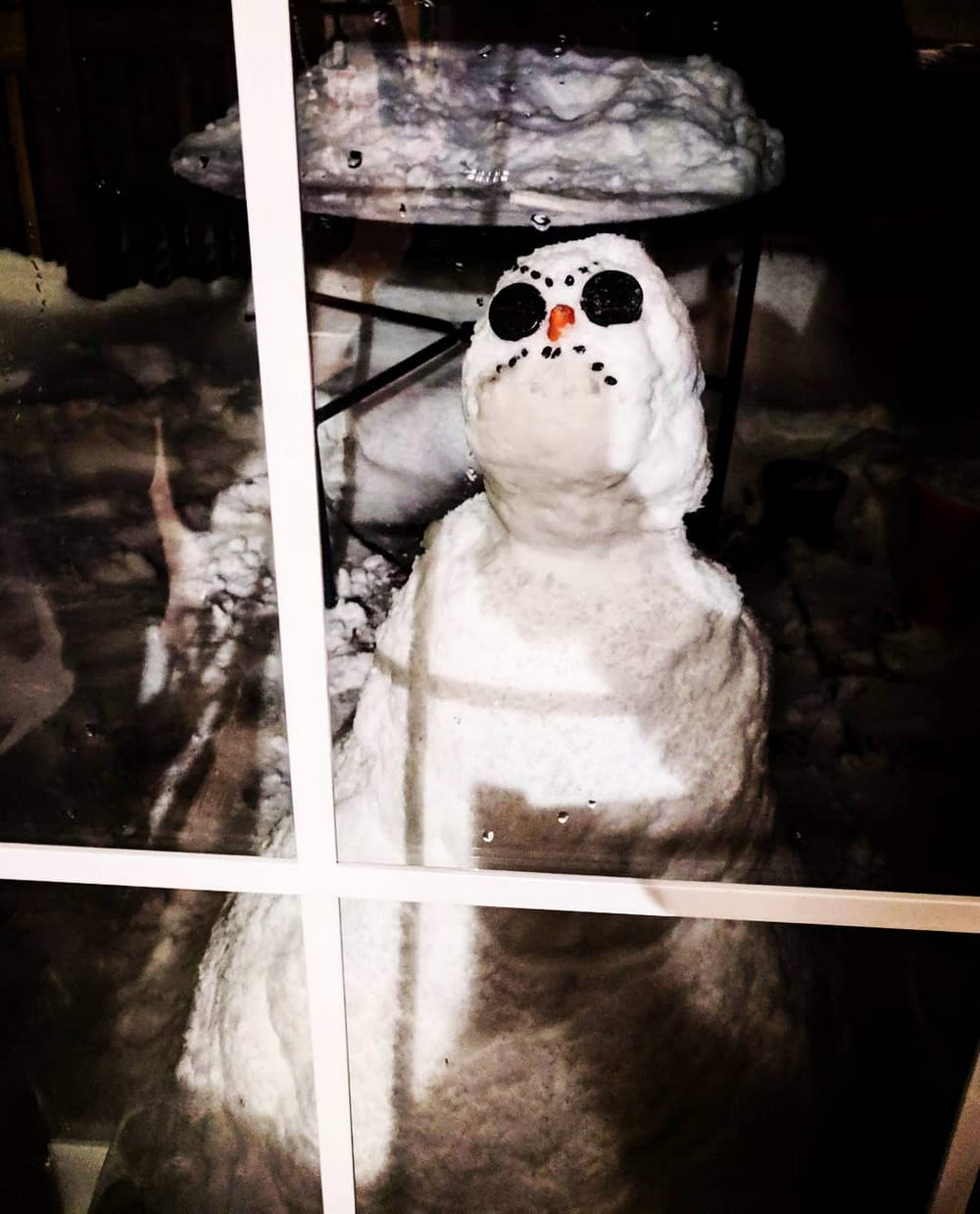 wtf images - angry snowman looking ready to beat you up
