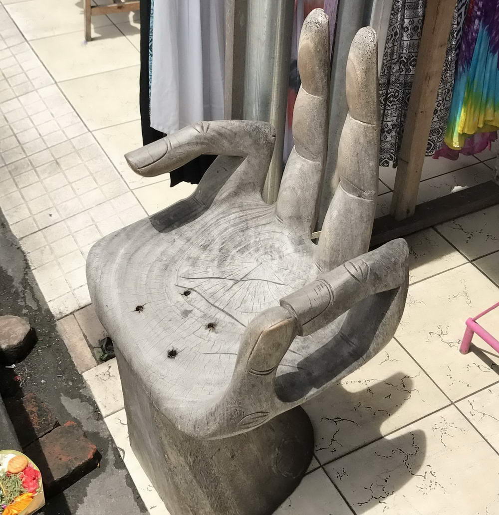 wtf images - weird wooden hand seat statue