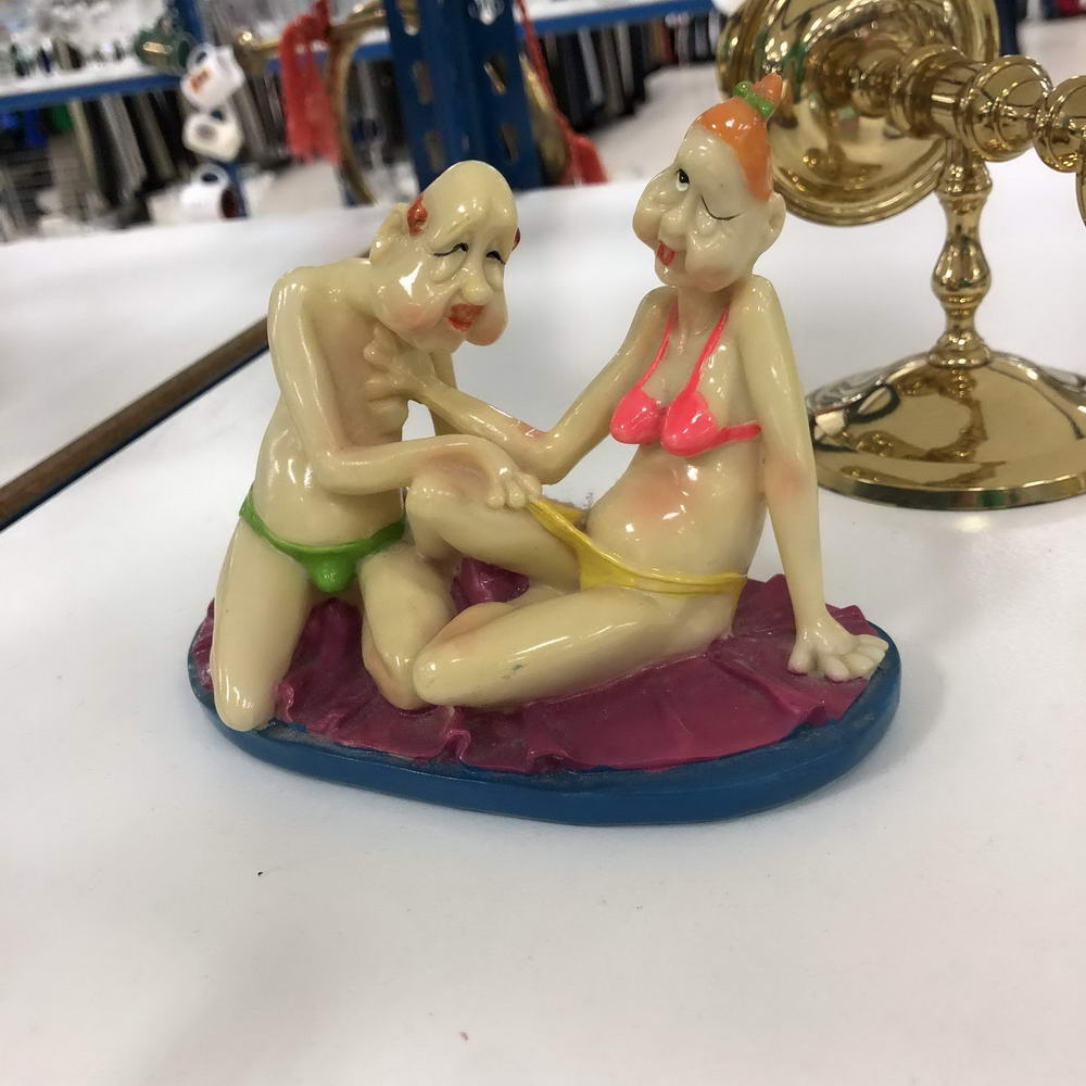 wtf images - creepy figurines touching each other