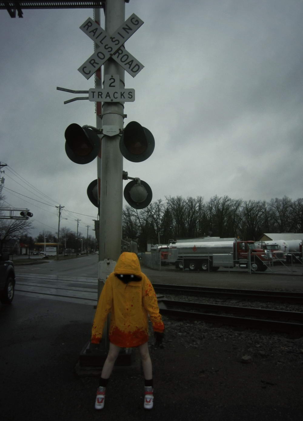 wtf images - demonic child standing next to railroad