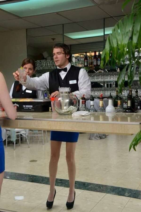funny optical illusions - male bartender with woman's legs