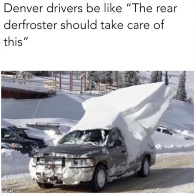 car buried in snow - Denver drivers be "The rear derfroster should take care of this"