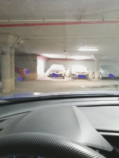 “It snowed two feet overnight and this unlucky neighbor’s car in the underground parking lot is next to a large grate.”