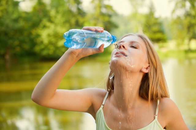water woman struggling to drink