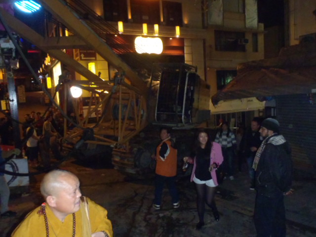 Friday night, lots of drunk people, heavy machinery going down the central bar street, good days in Hong Kong :