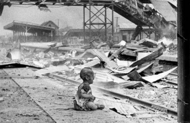 A baby cries at a bombed train station in Shanghai, 1937
