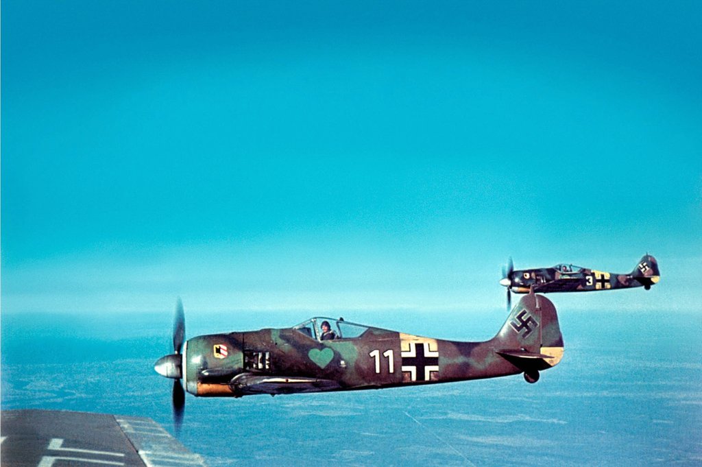 Beautiful color image of the German Focke-Wulf Fw 190A-5 fighters, of Fighter Squadron JG54, during flight, 1943