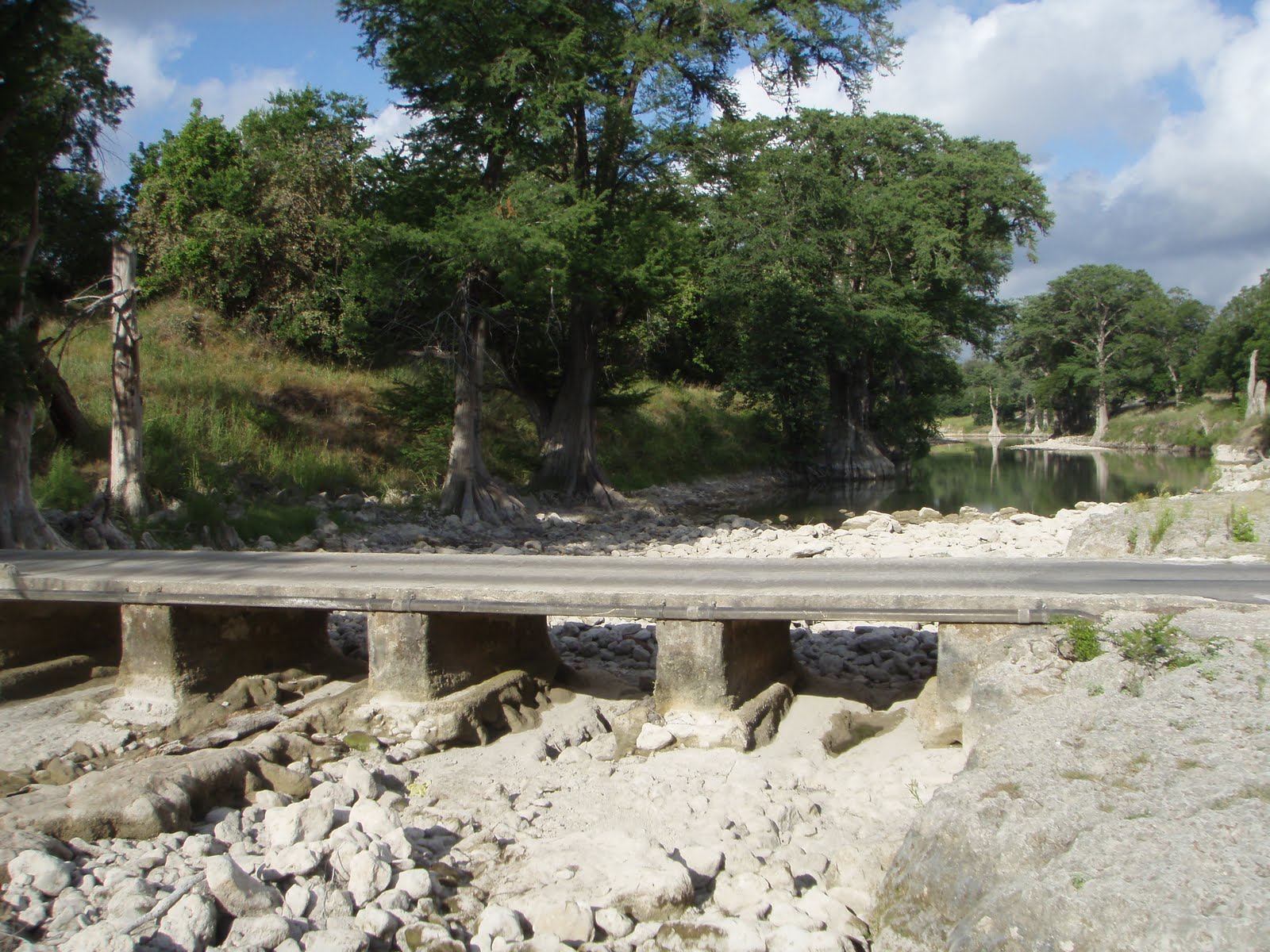 Drought at the Quadalupe River.  The water is usually at the bottom of the top portion of the bridge.