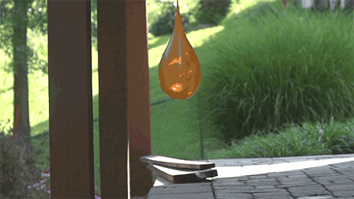 slow motion gif funny water balloon