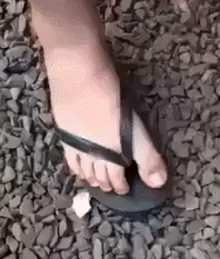 toe flip off gif