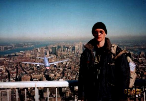 a guy posing on the world trade center