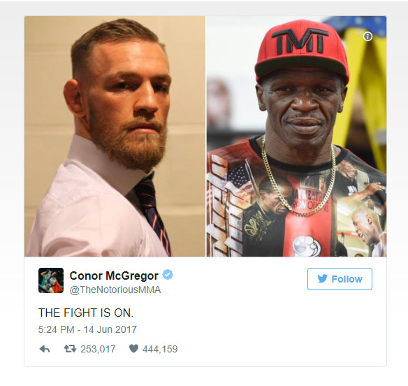 Tweet of Floyd Mayweather Sr and Conor McGregor with the text THE FIGHT IS ON