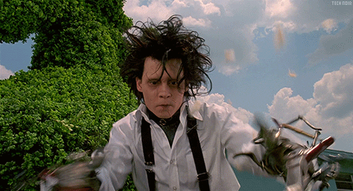 Johnny Depp trimming the hedges GIF