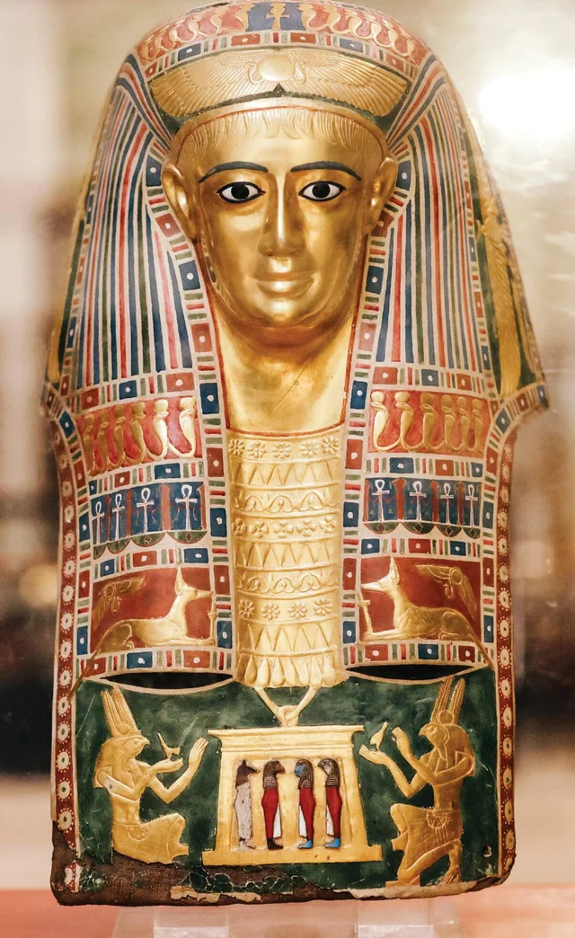 A gilded and painted cartonnage mummy mask of a man. From Meir, Roman Period, ca. 30 BCE-395 CE, now housed at the Egyptian Museum in Cairo.