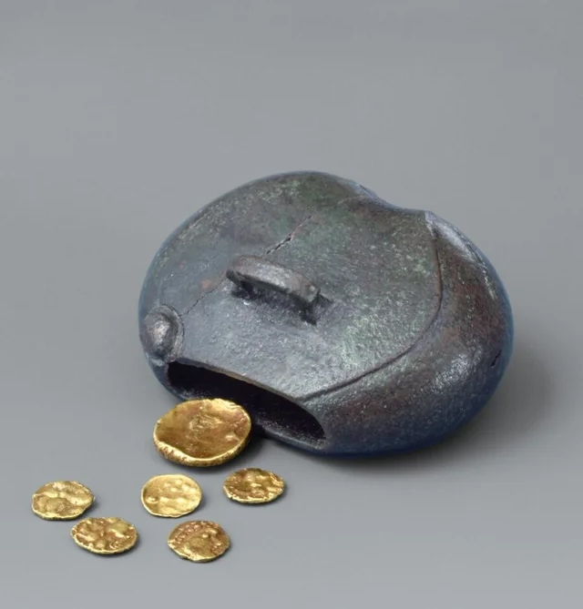 This small bronze purse (4.3x3.3 cm) was found with six gold coins still inside in the Celtic oppidum (settlement) at Manching, Germany. It was originally sealed with an organic material, presumably a leather strap. Ca. 200 BCE.