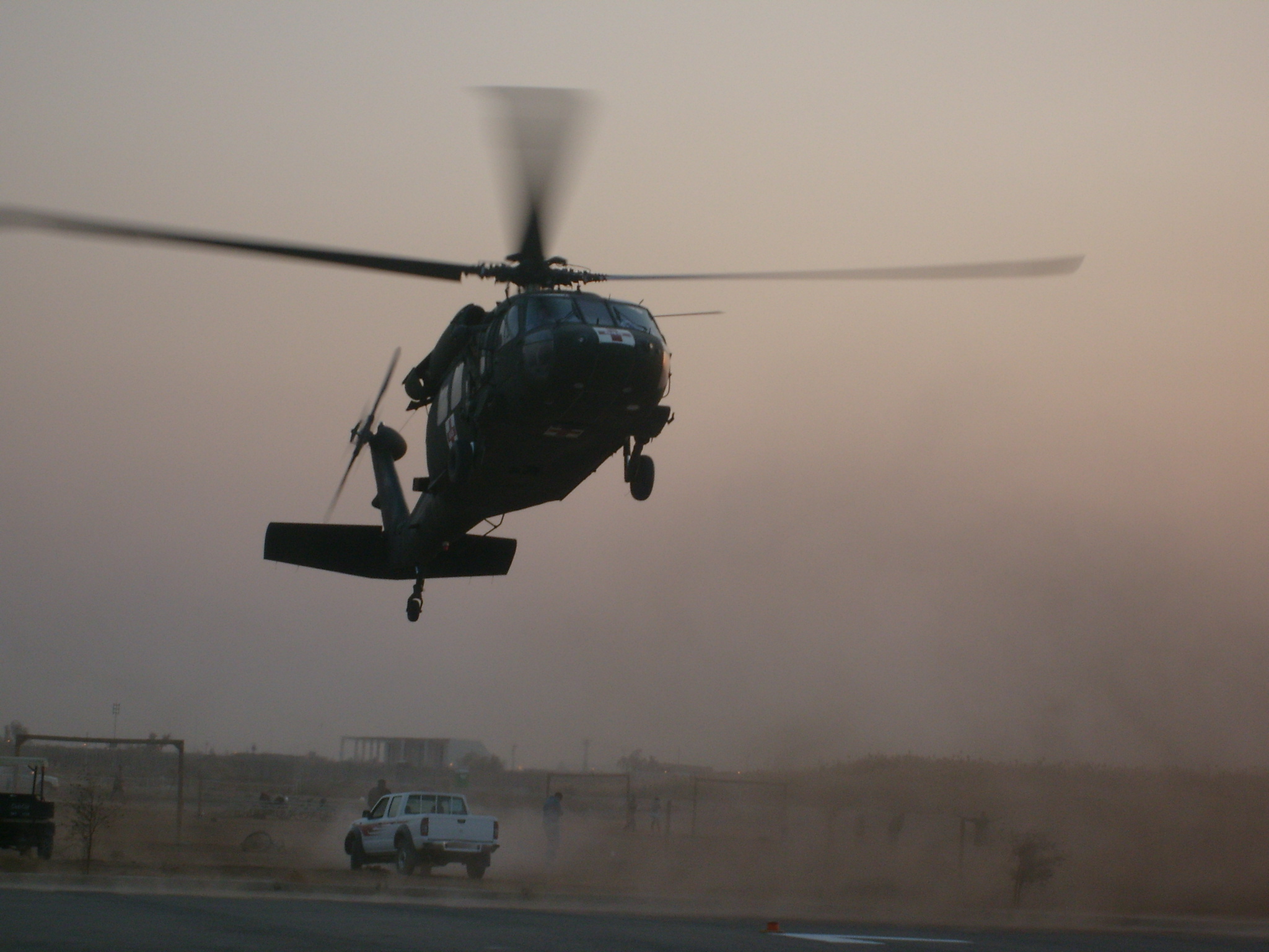 A UH-60 Blackhawk MEDEVAC bird flying in to take away our casualties
