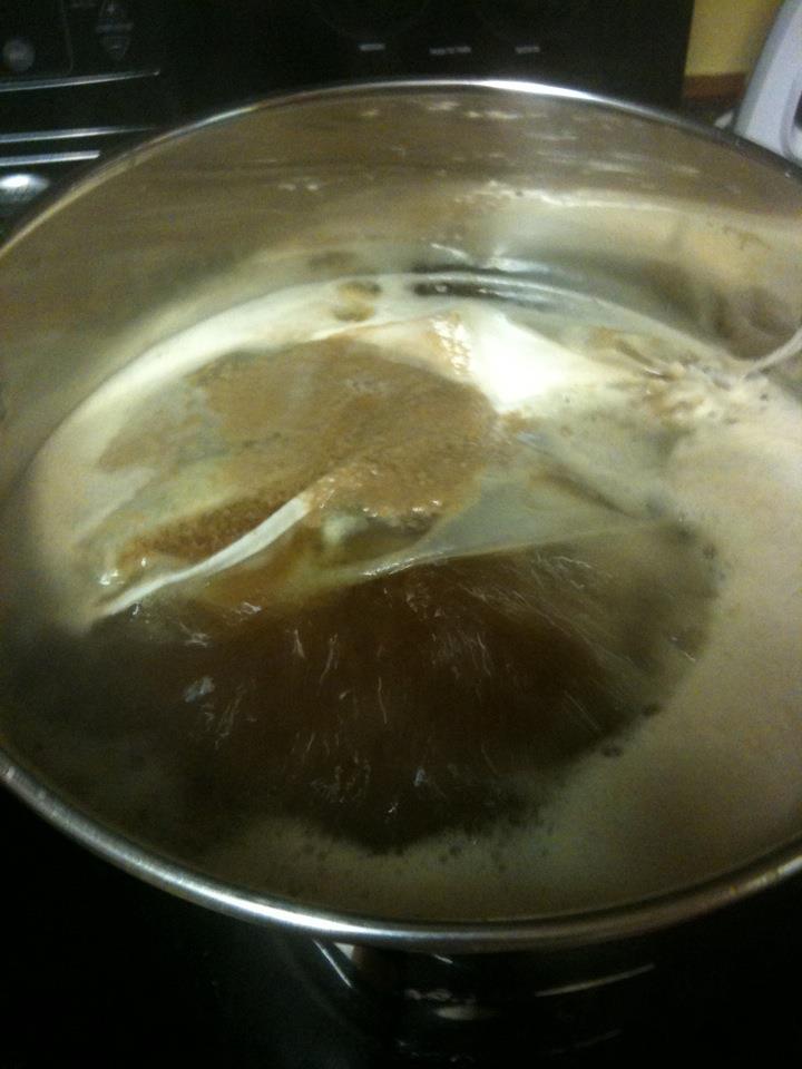 Boiling the hops, after steeping my grains and adding my malt.