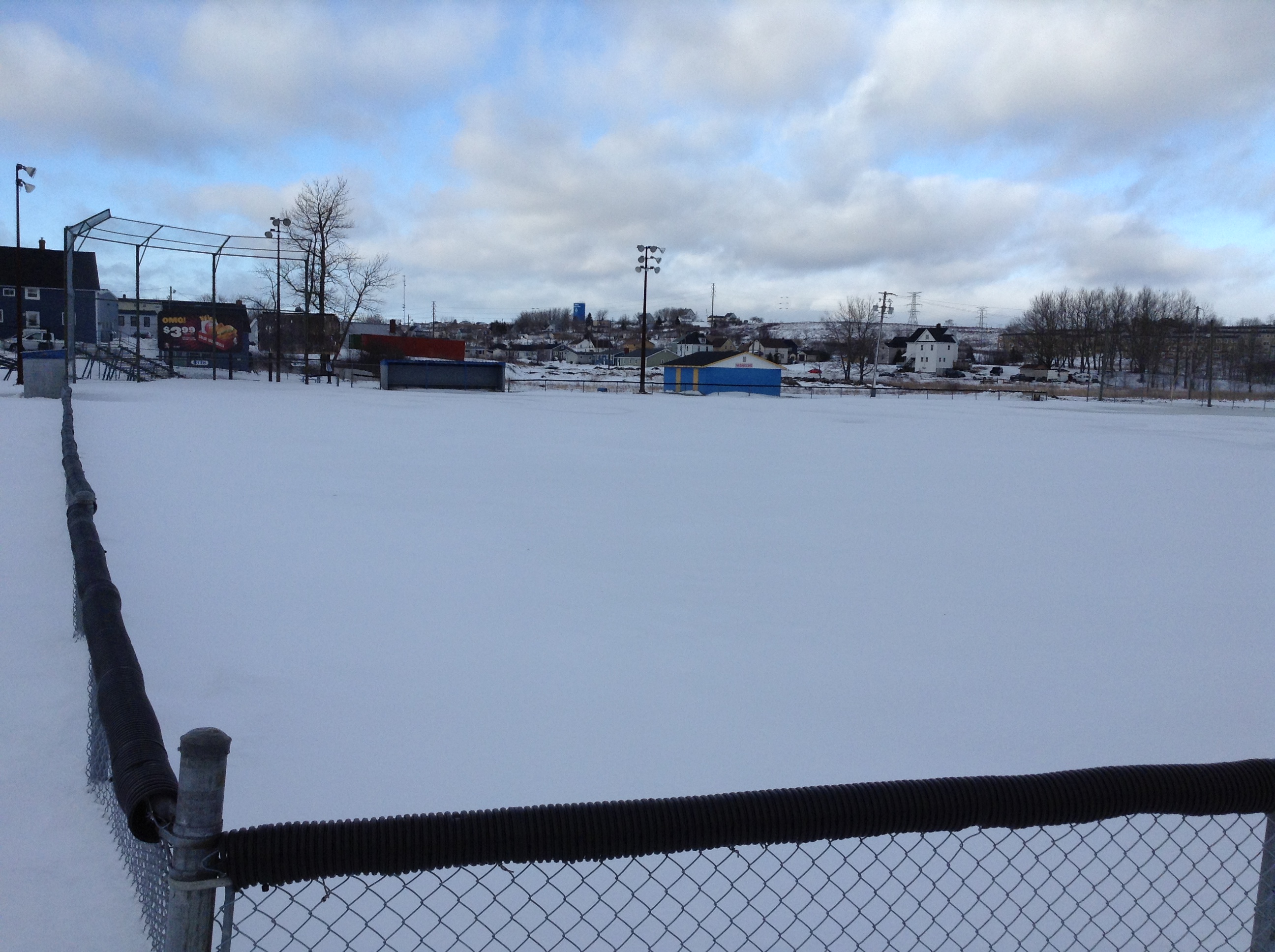 Whitney Pier Ballfield is Covered with snow and No Ballgames and the Ballfield looks Deserted during the Winter Time.