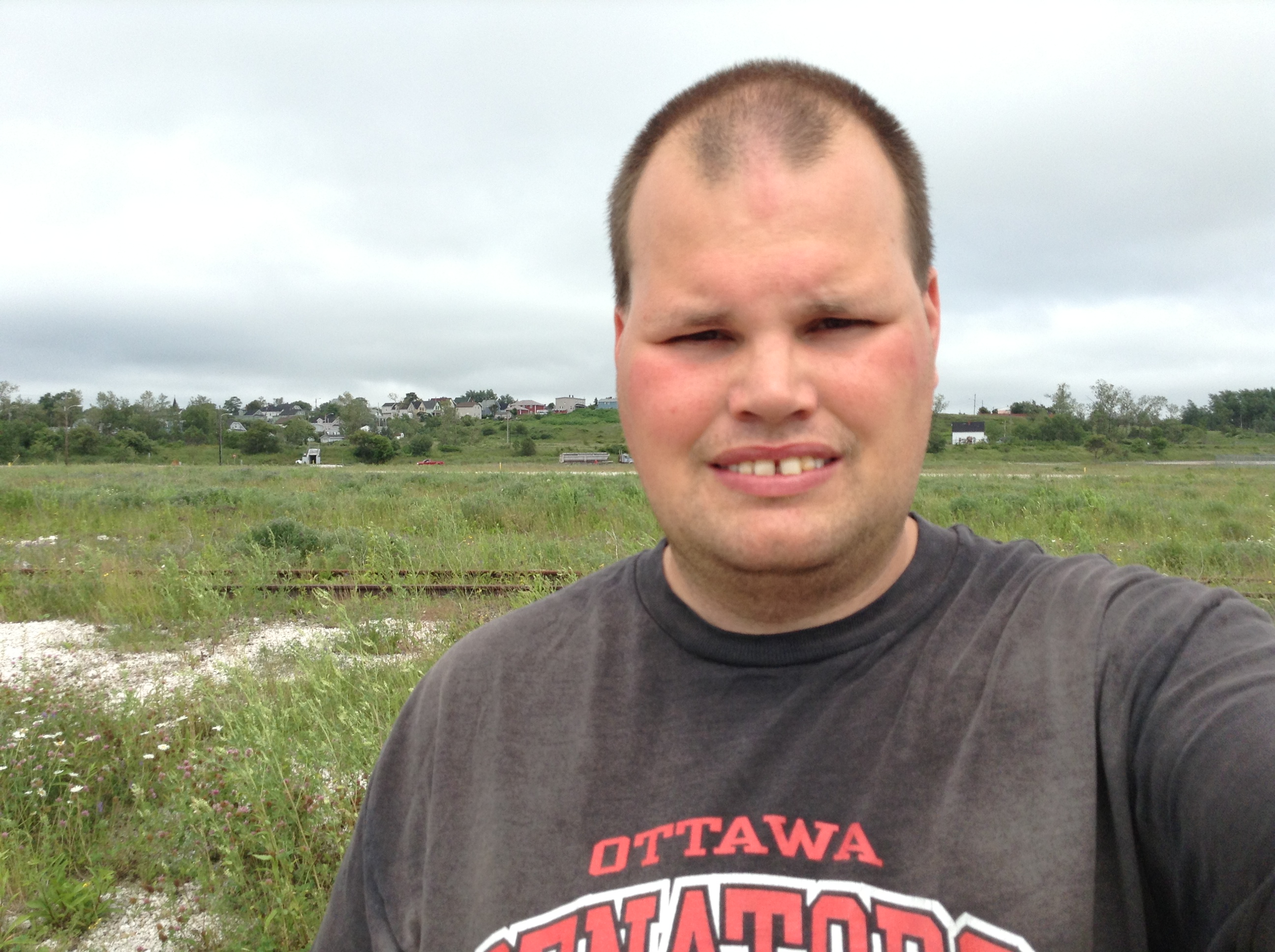 Frankie MacDonald is enjoying the Nice Summer Day and it is muggy and humid outside and he is going for a walk.