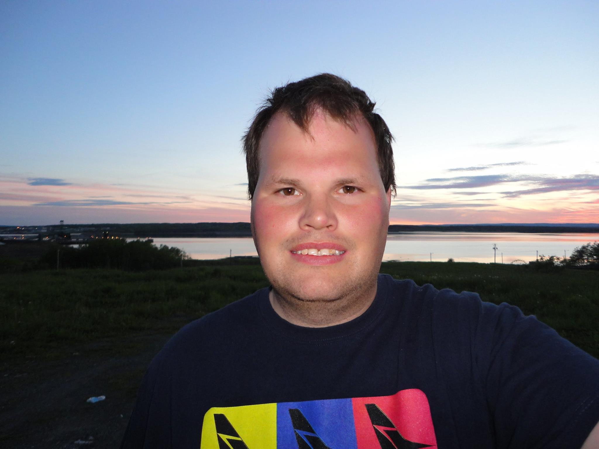 Frankie MacDonald is Enjoying the Warm Mid June Evening in Sydney Nova Scotia in the Whitney Pier Area and during the Sunset.