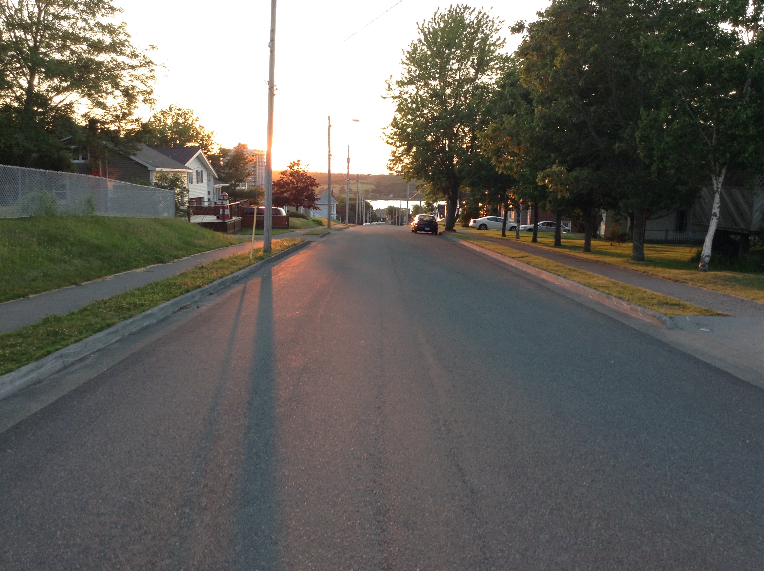 Castle Drive is One of the Side Streets that Connects From Alexandra Street to Kings Road and it is Heading Downhill during the Sunset.