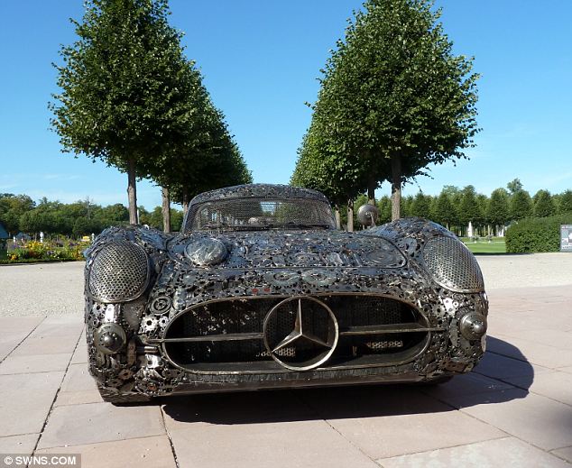 Mercedes 300 SLR recreated out of 10,000 pieces of scrap metal