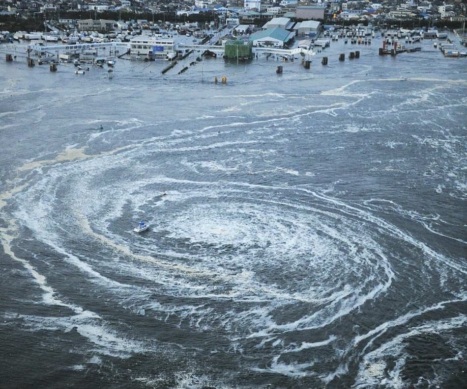 A whirpool forms off the Japanese coast after the tsunami on March 11. 