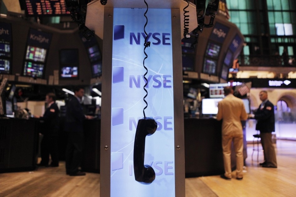 A phone hangs off the hook on Wall Street.