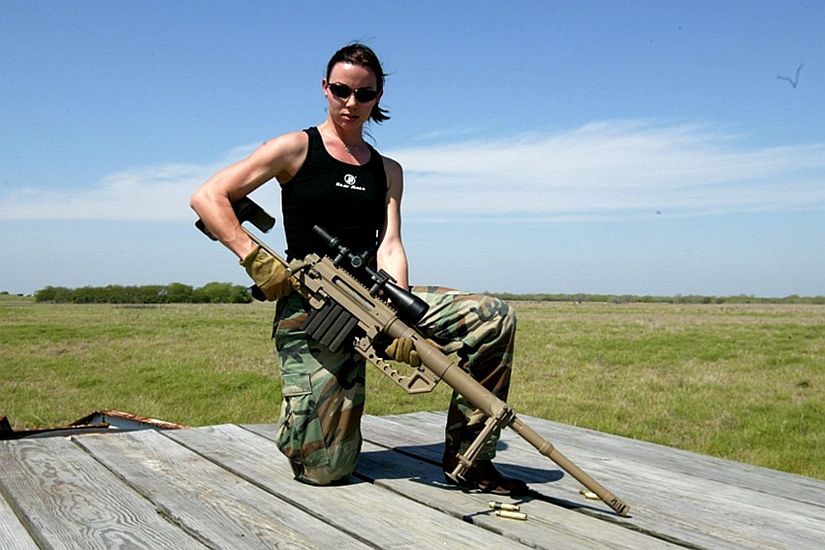 A hot ,but dangerous babe sporting a .50 cal sniper rifle