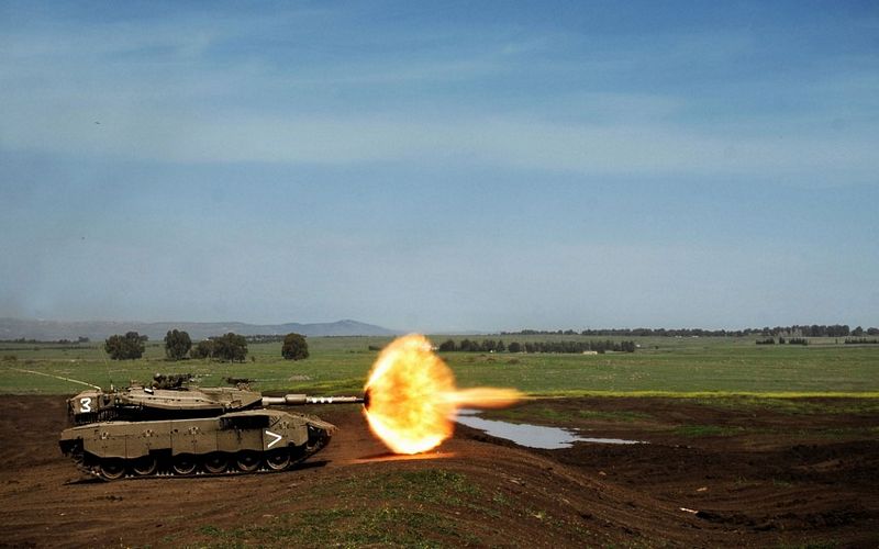 Tank firing off a round