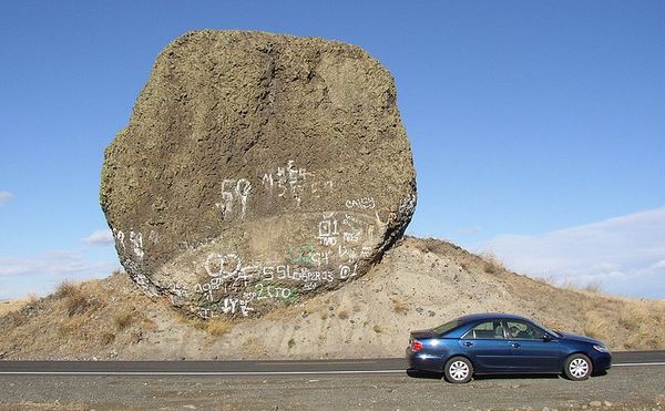 Yeager Rock, a 440-ton "glacial erratic" on the Waterville Plateau, Washington, ice-rafted to its present location 13,000 years ago inside the 4,000-foot-thick Cordilleran Glacier. The boulder plunked down when the ice melted.