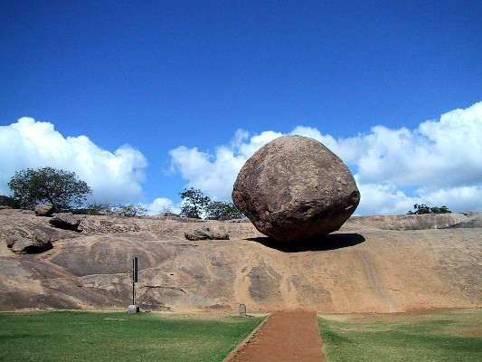 "Krishna's butterball" is a giant glacial erratic perched on a hillside near Mamallapuram, India.