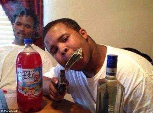 Michael Brown's Micheal Brown : Big , powerful, full of the "Thug Life" and rolling in guns money and booze.