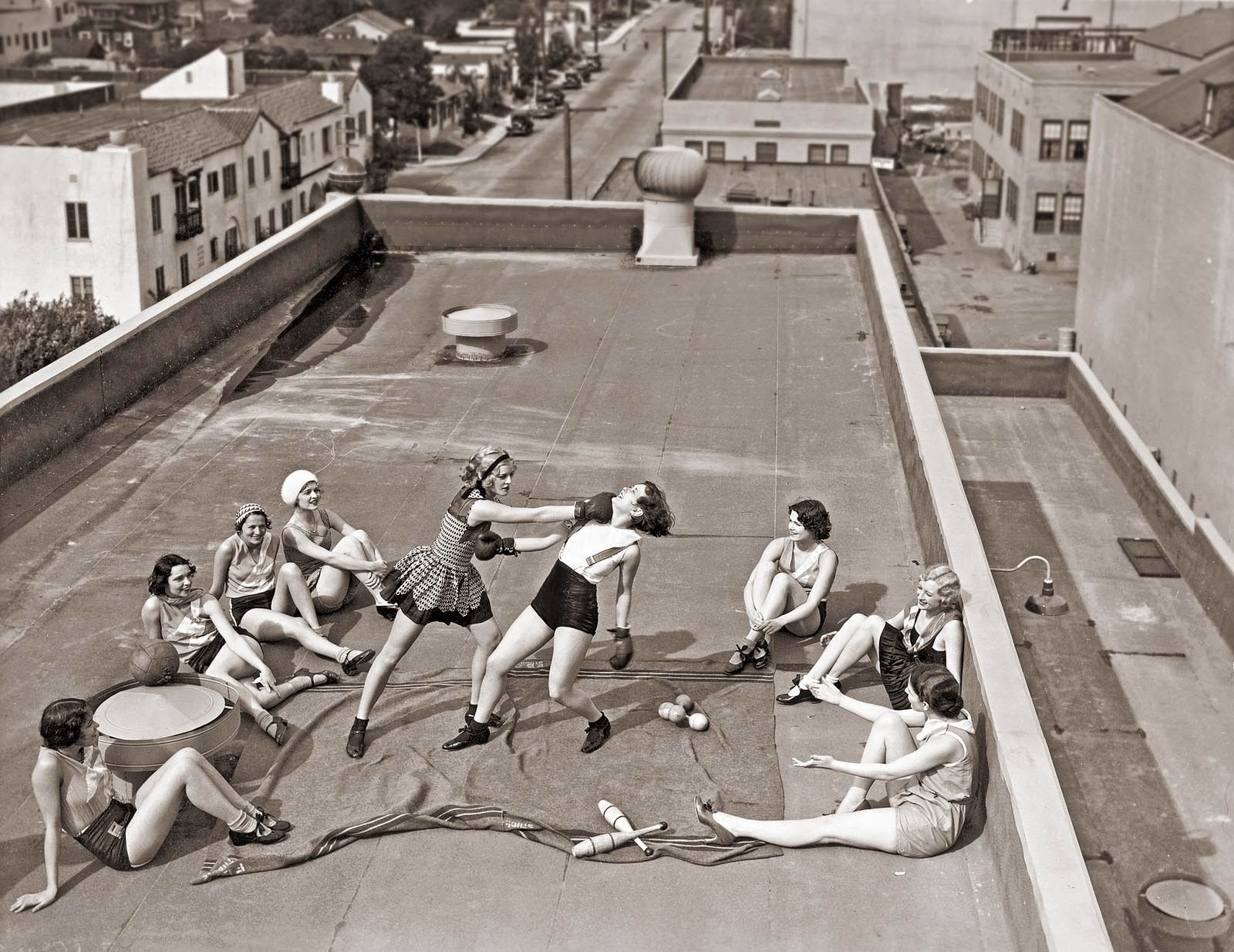 Women boxing on a roof, 1938