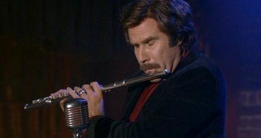 15.The Anchorman: In the night club, Ron plays jazz flute in the style of Ian Anderson, lead singer and flautist of Jethro Tull. Ron blurts out "Hey Aqualung!" at the end of the song, a lyric from the Jethro Tull song "Aqualung", the title track of their 1971 album. In addition, the riff that he plays on the flute just before he does so is the main riff of the same song. Indeed, the scene is rife with Tull references, as the pose Ron strikes at the end of the song is also a clear imitation of the band's logo of a flautist turned sideways with one leg up.