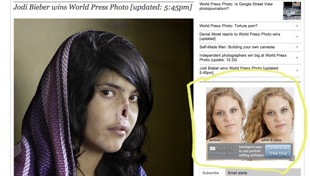 A photo of a young girl mutilated by the Taliban next to an ad for
portrait software