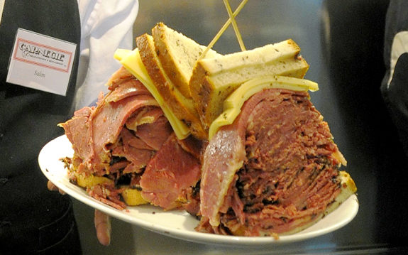 The famous one pound pastrami sandwich from NYC's Carnigie Deli.  Does anyone need a doggie bag?