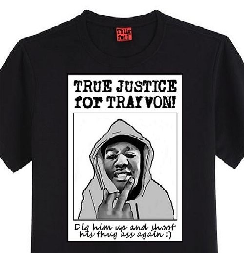 Last Sunday at a Chicago rally in the support of Trayvon, Anfonee Jackson showed up with his new Justice For Trayvon shirt.  He was shot several times and his family said it was the result, "One big ass mistake."