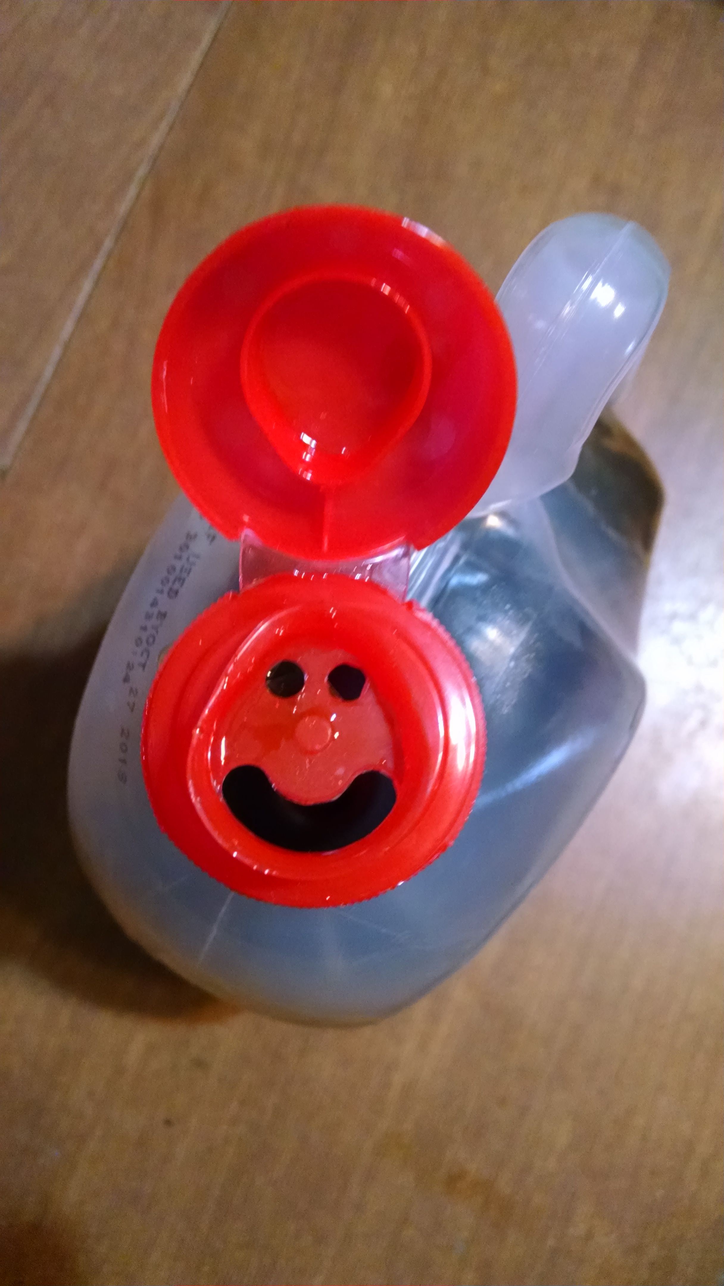 Top of a pancake syrup bottle