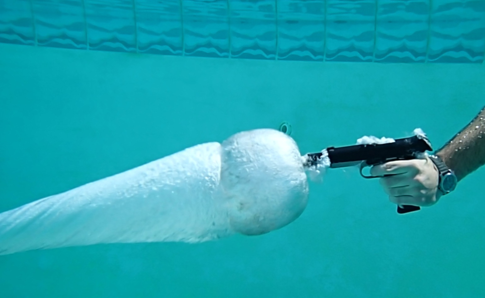 shooting a gun underwater