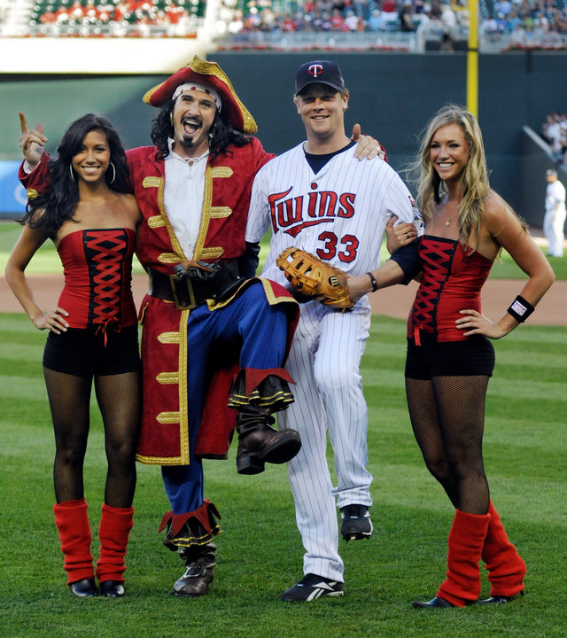 Justin Morneau of the Twins having some pregame fun with some hotties!