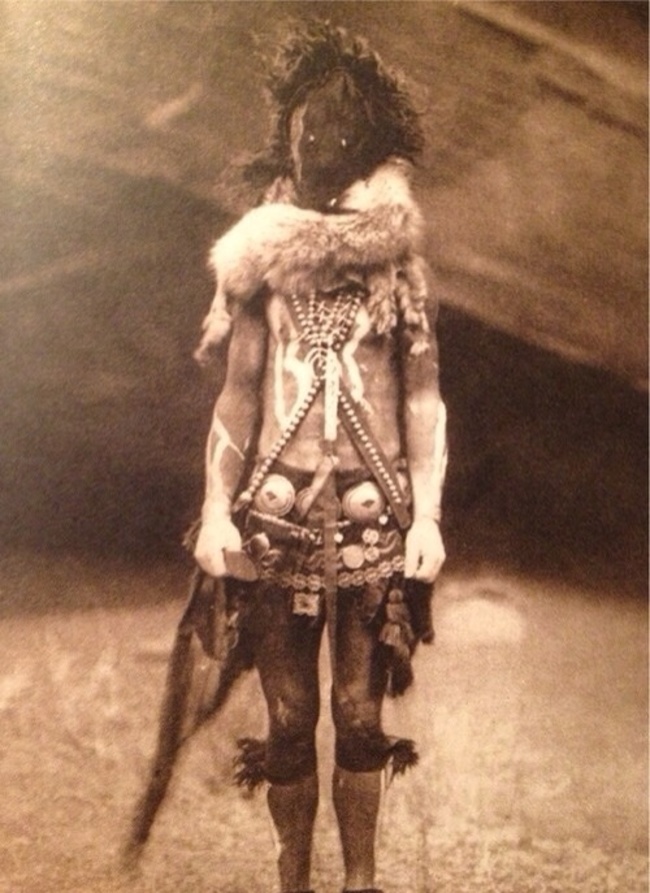 A Navajo man dressed up as a Nayenezgani spirit.