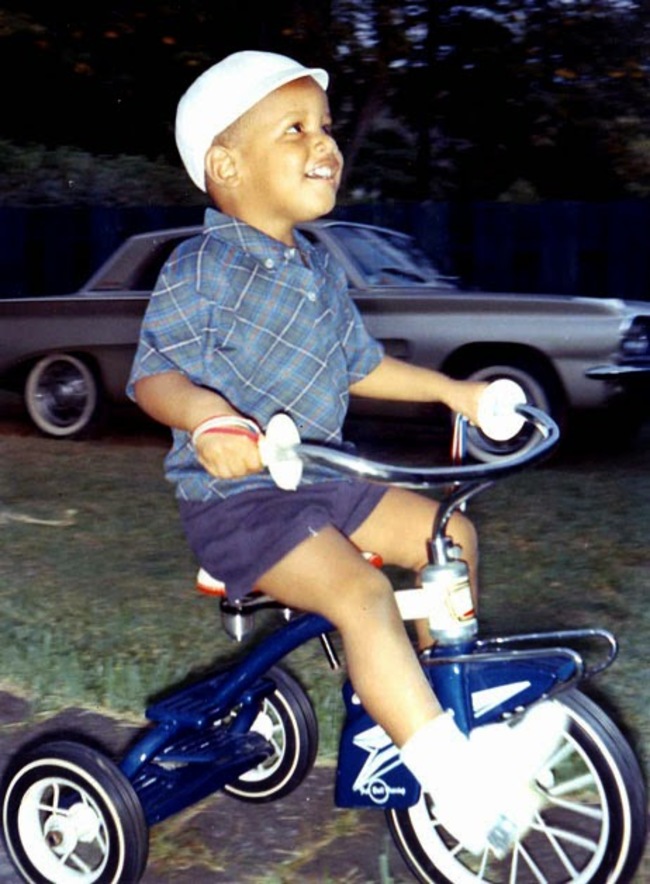 Barack Obama, 4, riding a tricycle. [1965]