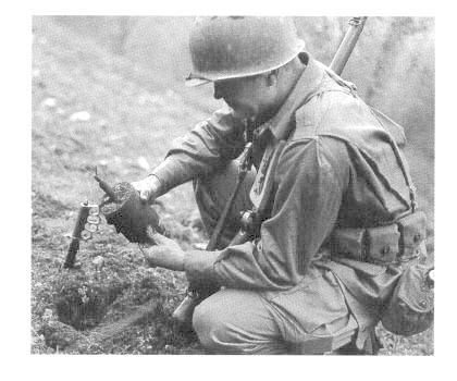 WWII Soldier Removing Land Mine