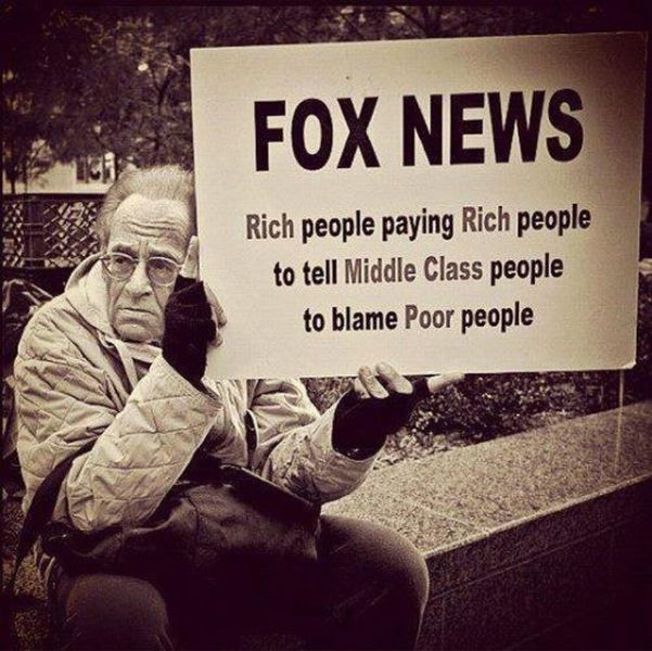 This guy has a sign telling exactly what Fox news is really about.