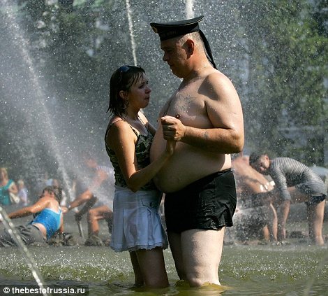 Dancing in a St Petersburg fountain