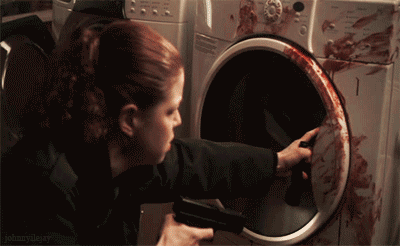 gifs - persons open a washing machine and a dead person is inside