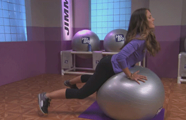 gifs - woman works out on a exercise ball